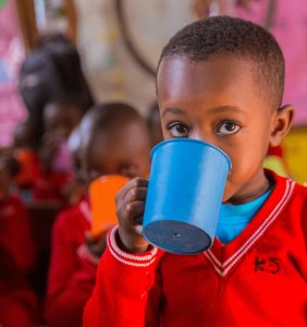 Pupil taking water